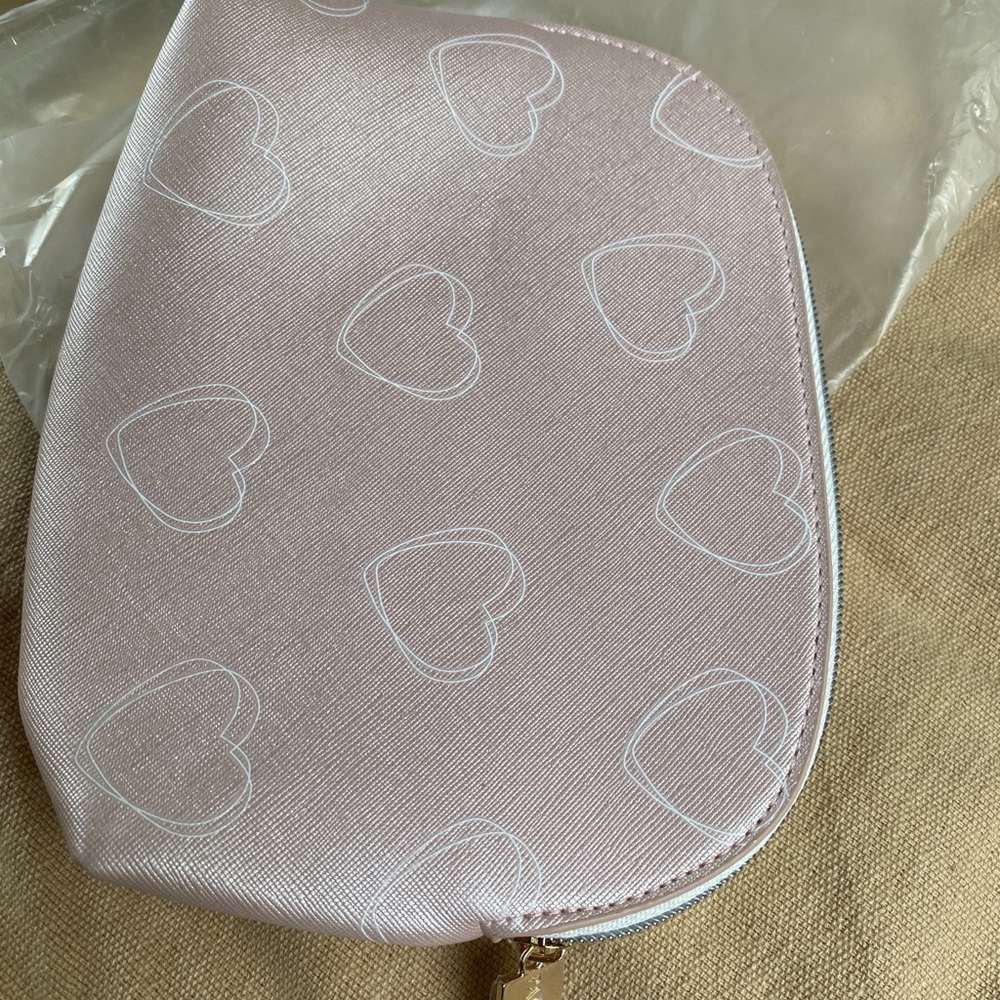 small pink makeup bag from Pandora